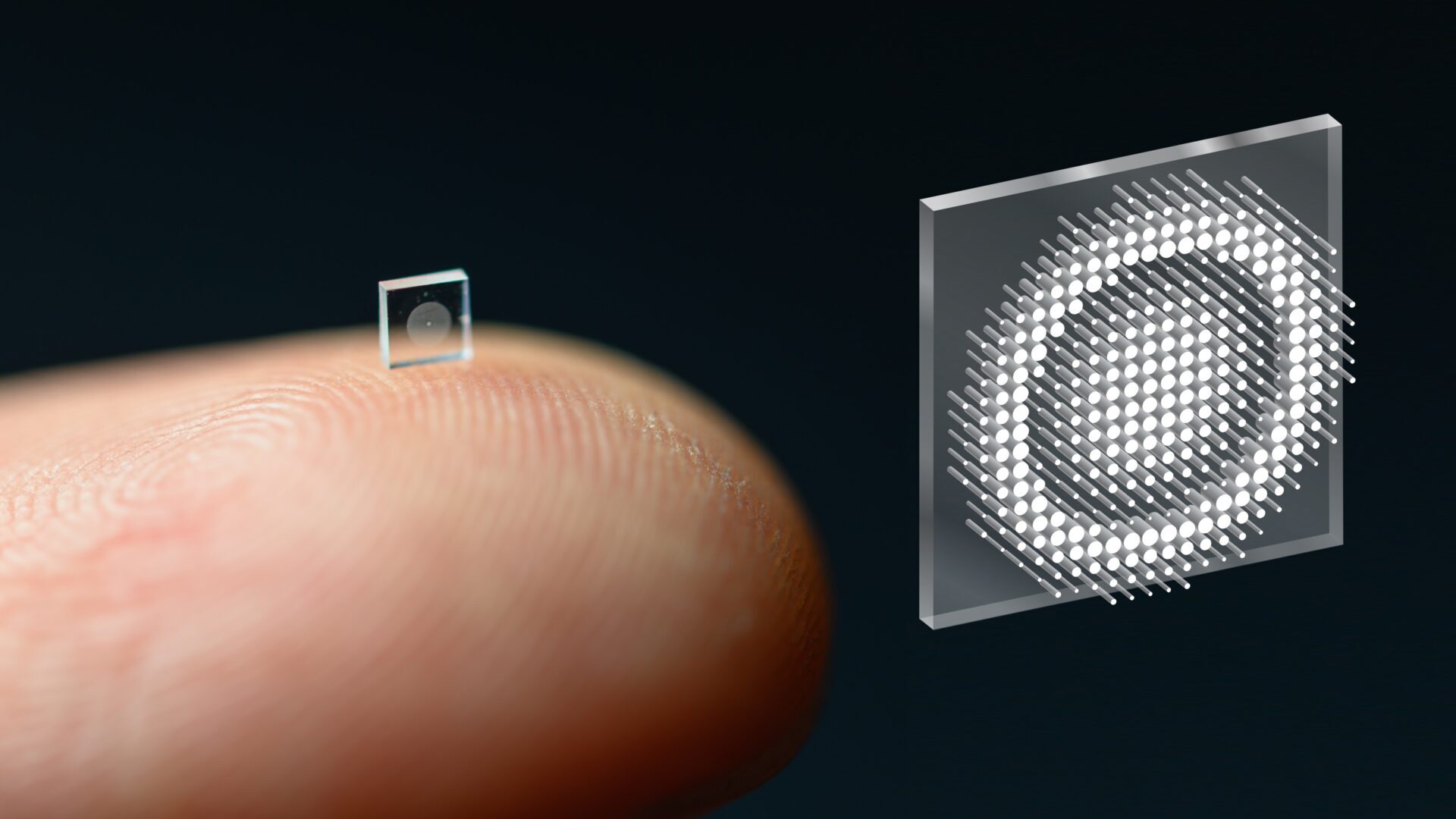 A picture of a finger with a half milimeter metasurface next to a blown-up version of the metasurface showing the optical cylinders spread out in a circular pattern.