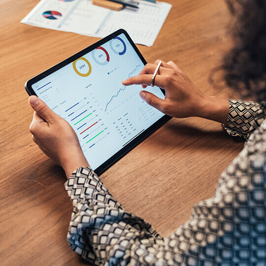 Closeup of someone viewing data on a tablet