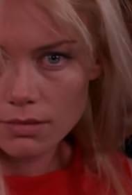 Simon MacCorkindale and Peta Wilson in La Femme Nikita (1997)